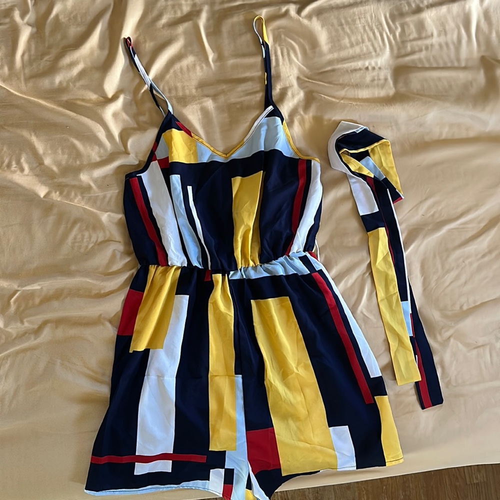 Light summer romper with belt